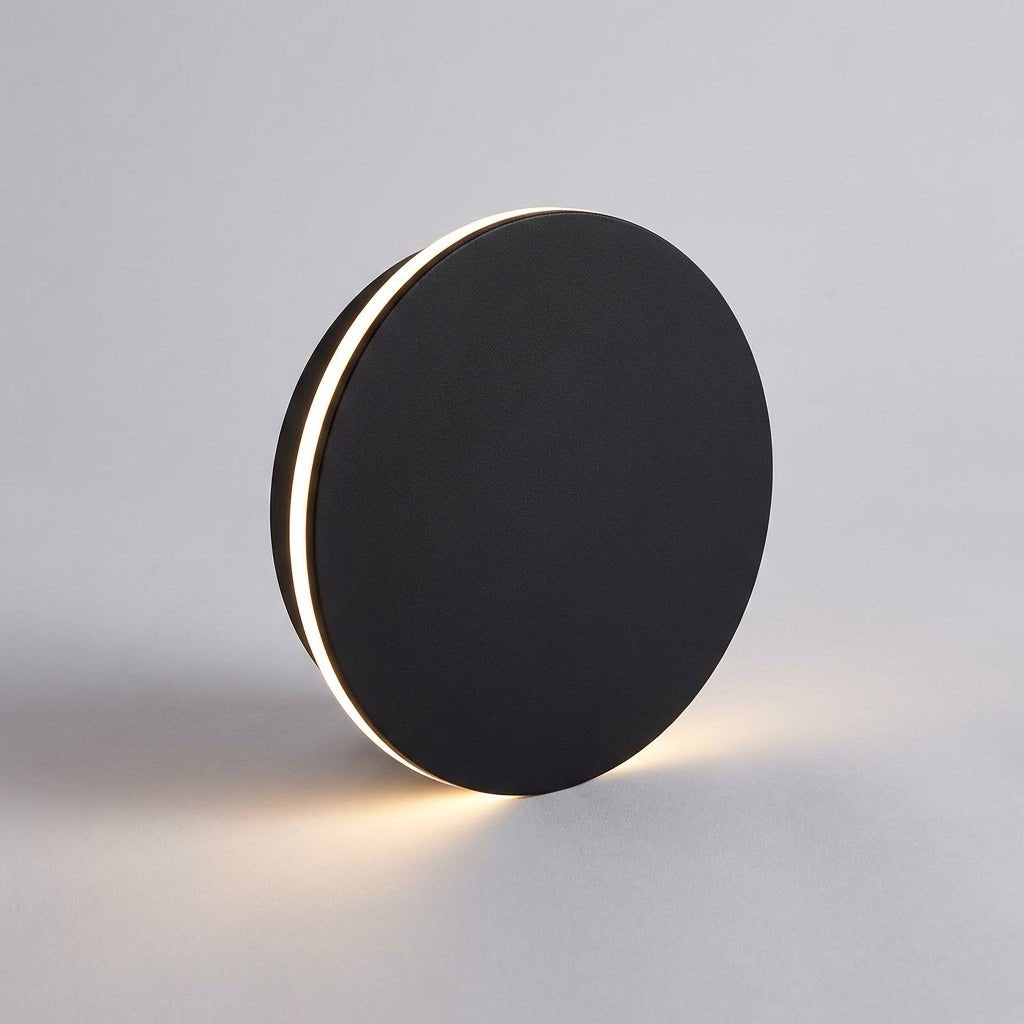 Modern outdoor wall lamp featuring up and down lighting, crafted from weatherproof metal for durable exterior use. 0